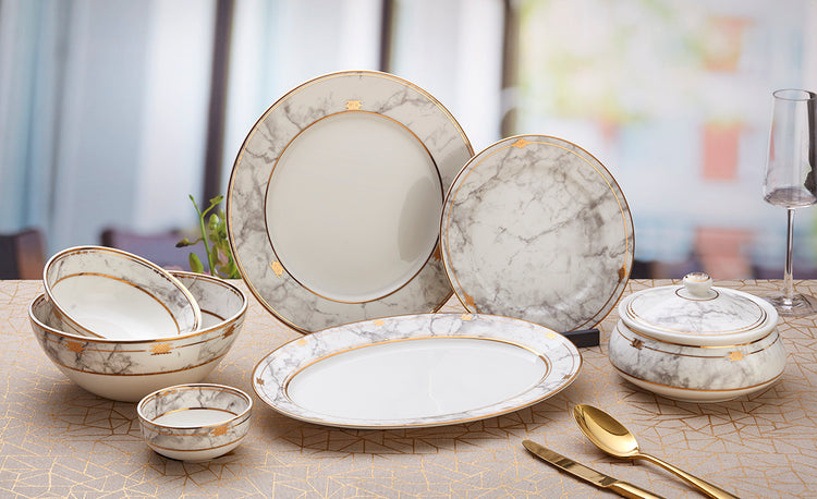 Elegant 22-piece dinner set with a marble-inspired design and subtle gold accents, perfect for a luxurious dining experience.